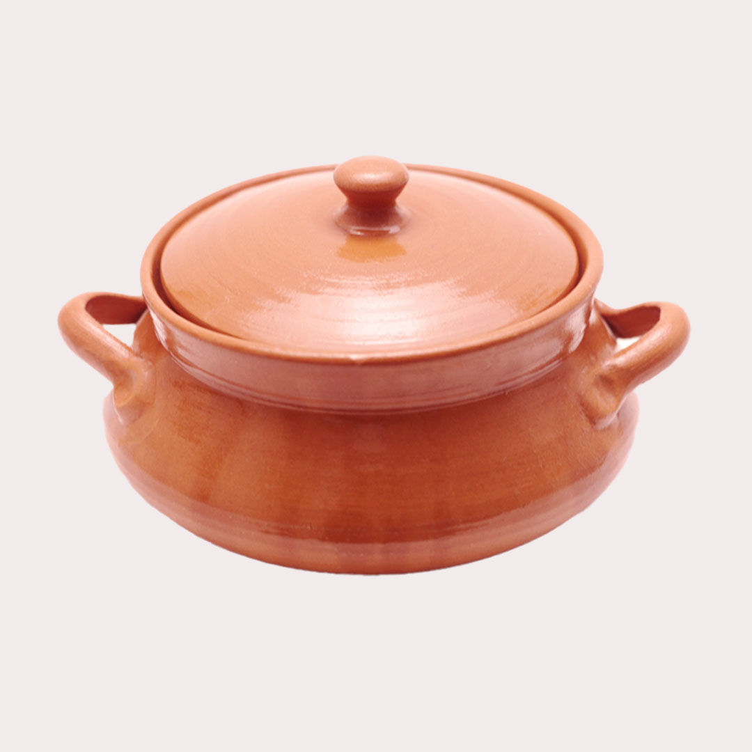 Glazed ceramic casserole, rounded